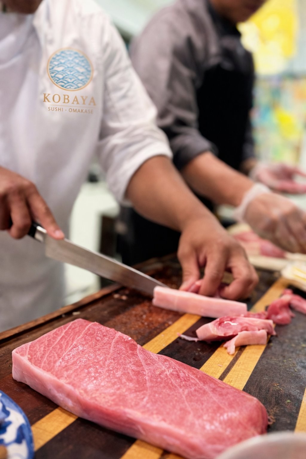 Kobaya sushi chefs preparing premium tuna for an omakase private catering event in South Florida